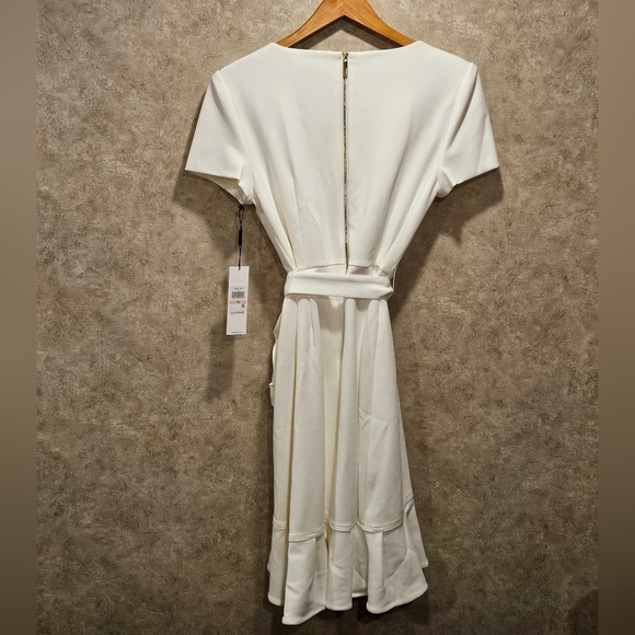 Calvin Klein NWT SZ 10 Ivory Short Sleeve Crepe Dress with Ruffle and Waist Tie - Picture 3 of 13